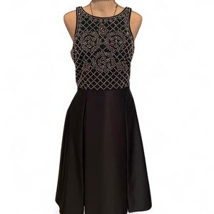 Xscape Black and Gold Sleeveless Prom Dress